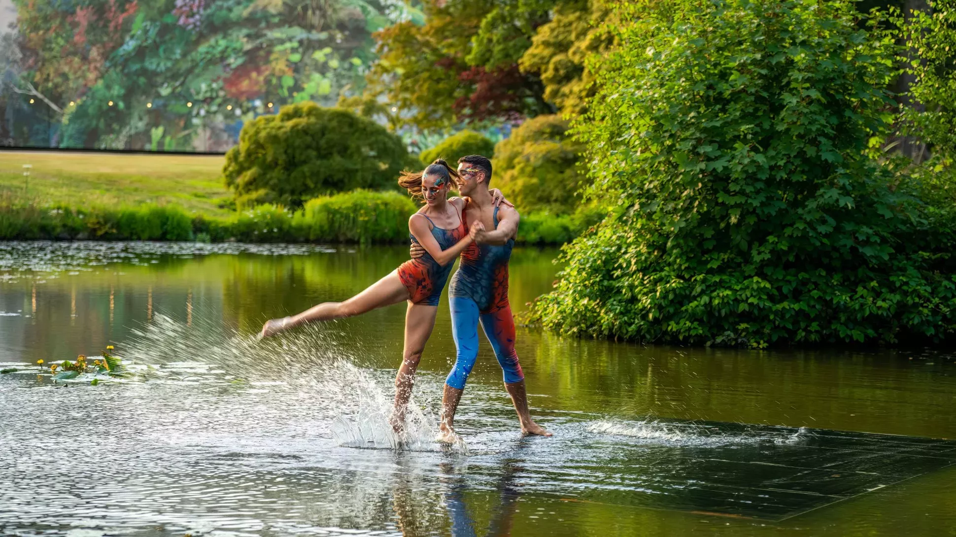 Wanderwild, Visual Air © RBG Kew A pair of people dancing on the surface of a pond