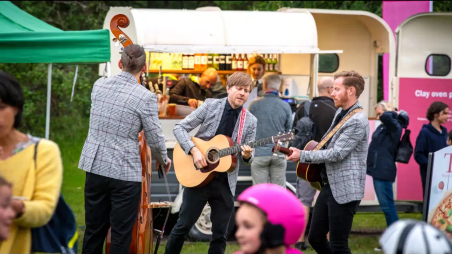 Summer Cycle © RBG Kew A band playing in a food truck area