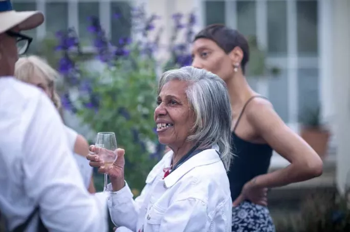 Wine walks © RBG Kew Woman holding wine glass