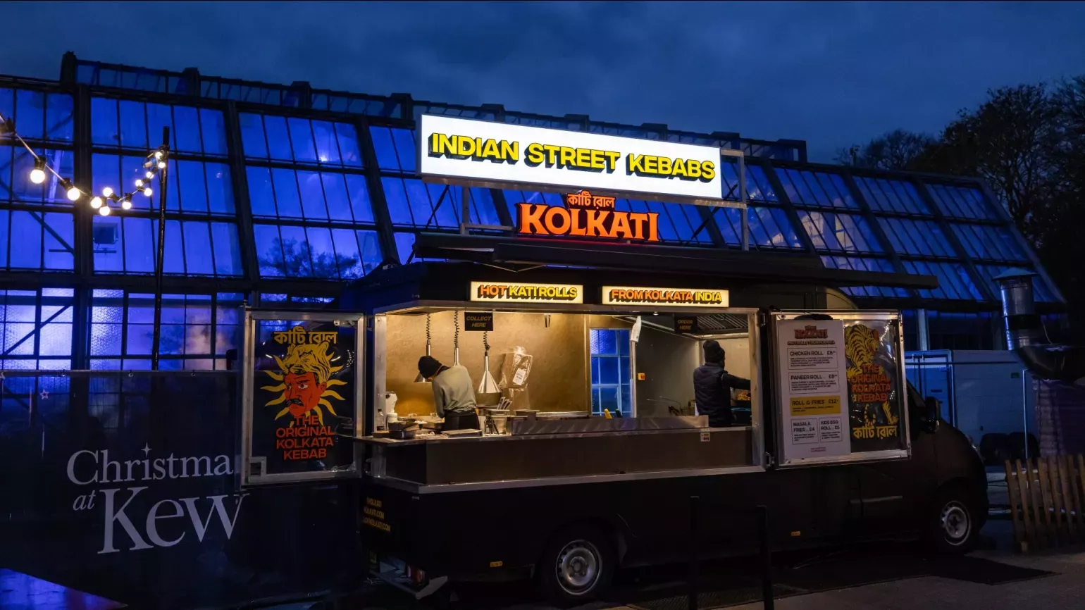 Indian street kebabs at Christmas at Kew © KERB A street food stand at night serving Indian kebabs
