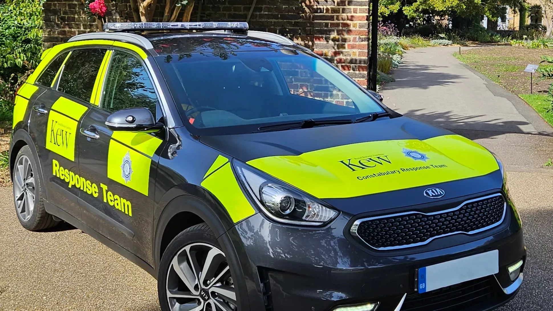 Kew Constabulary response vehicle A photo of the Kew Constabulary response vehicle which is a black car with neon yellow stripes